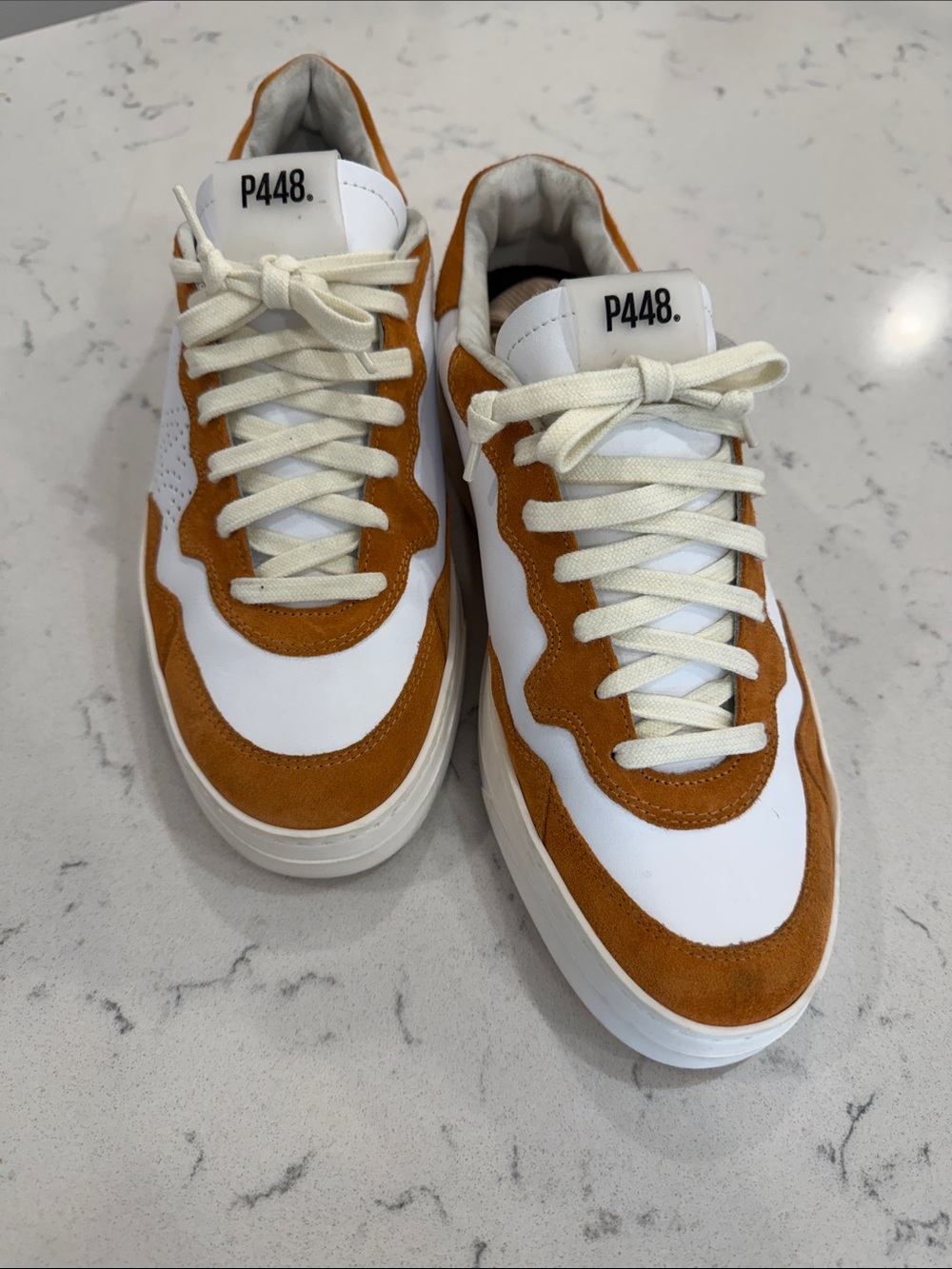 P448 Bali leather and suede low-top sneakers in white and warm rust/orange